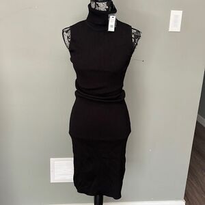 turtle neck black dress . NEW